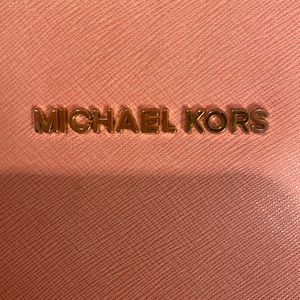 Micheal Kors light pink purse. Lightly used, bought for $168.